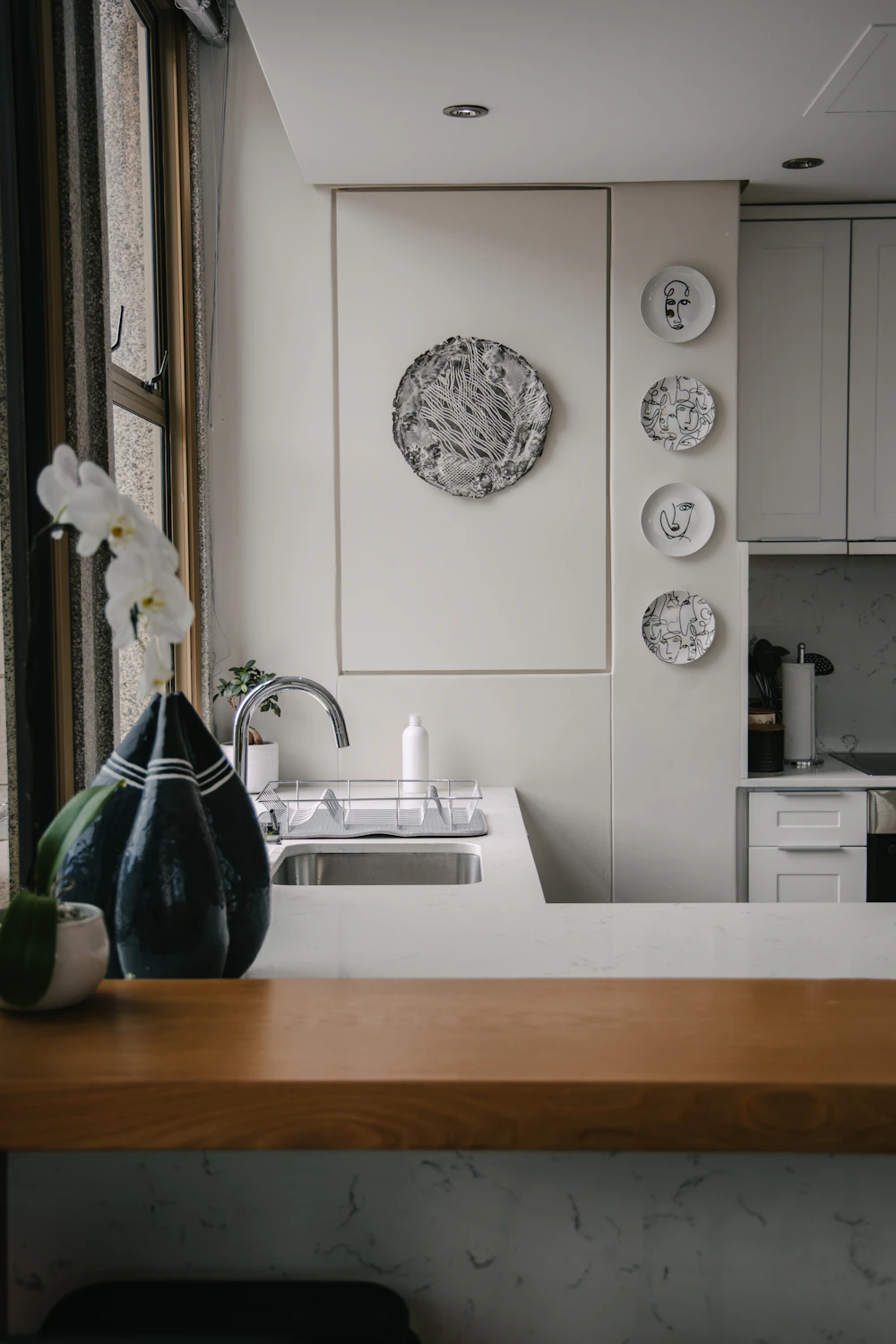 Clean kitchen sink and counter for a small-home fall cleaning reset