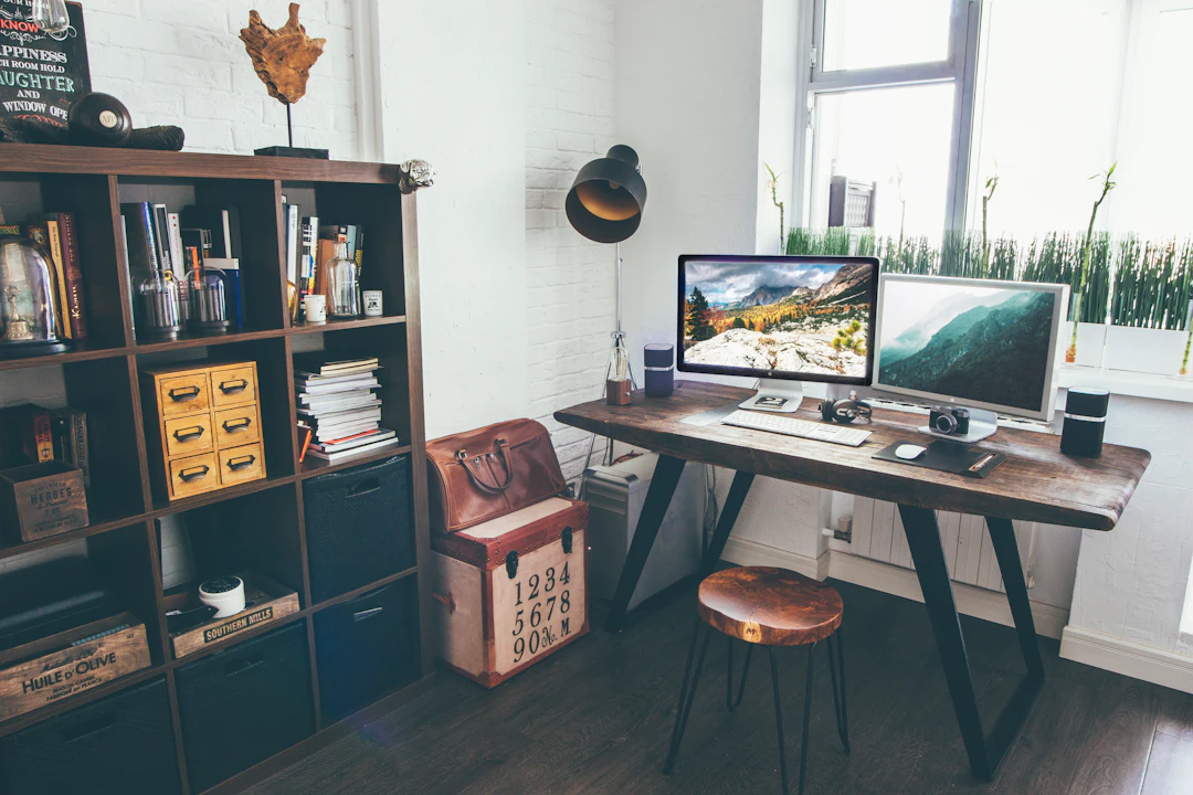 Home office desk with open shelving and practical storage