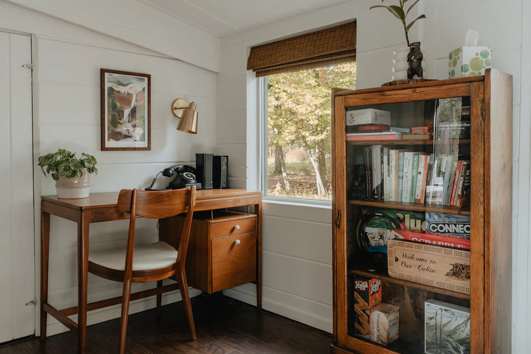 Home office nook with closed cabinet storage