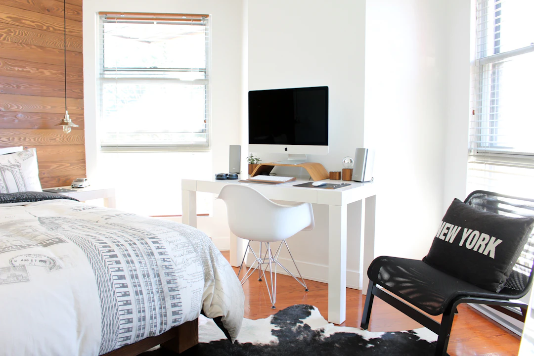 Bedroom workspace integrated into a loft-style sleeping area