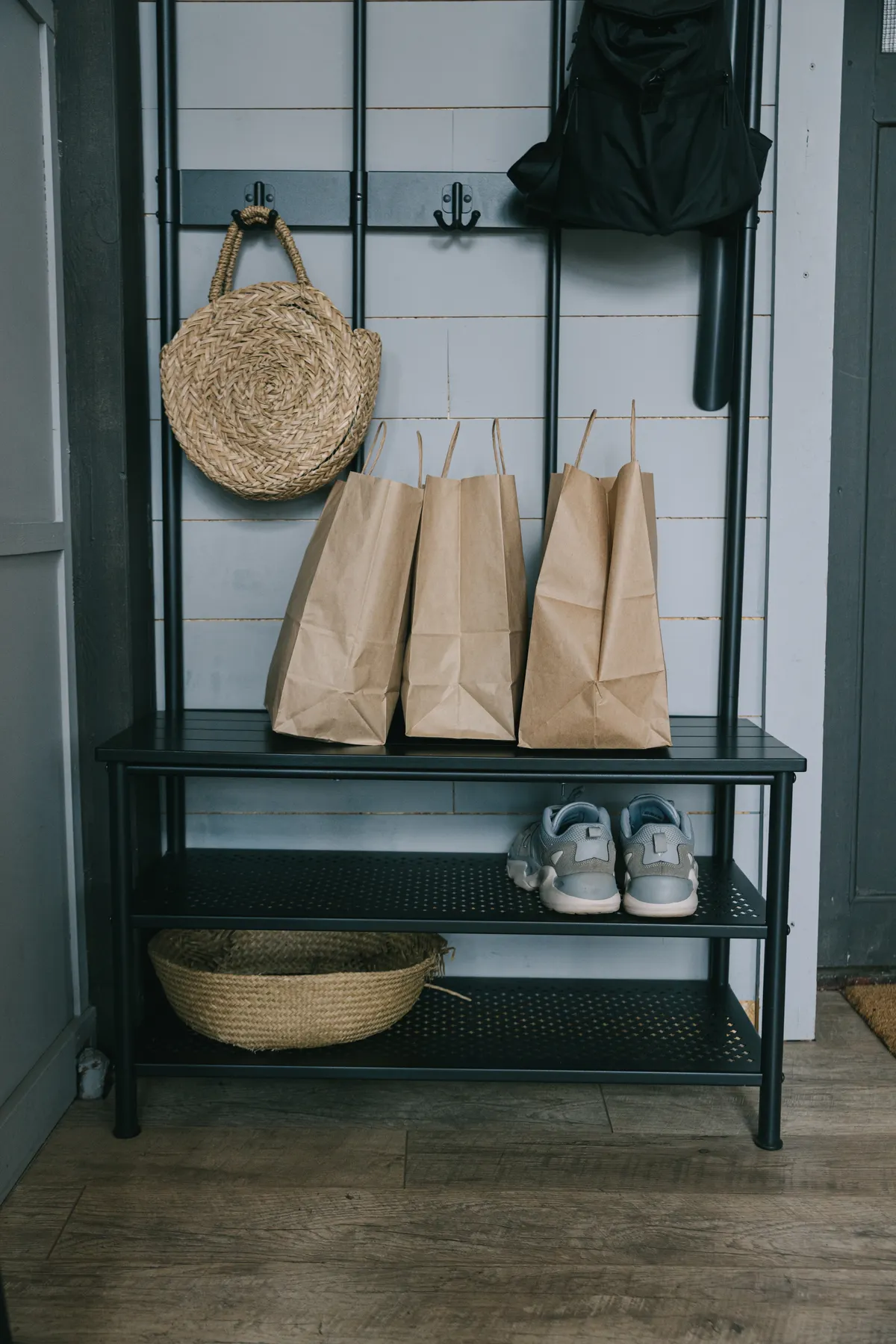 Bags stored together on a compact metal rack