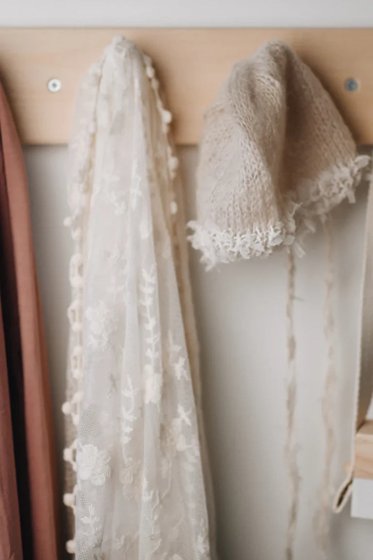 Renter-friendly wall storage hooks holding lightweight everyday items