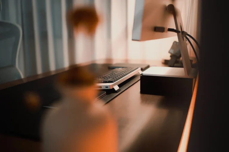 Compact home office desk with monitor and cable-managed workstation